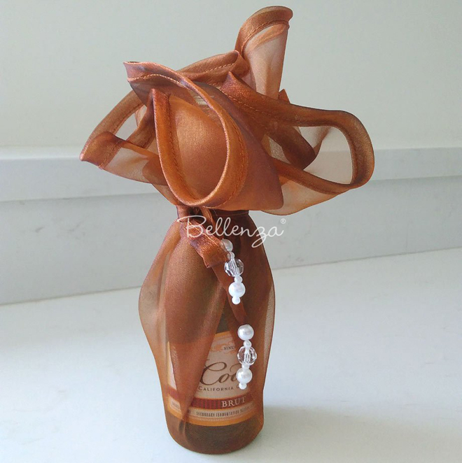 fall wine bottles in fabric wrapping