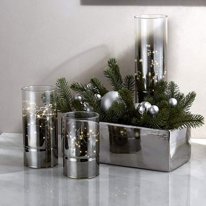 Hurricane lanterns with fairylights via Amazon